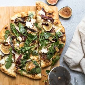 Fig, White Cheddar, Ham, and Lemon Arugula Flatbread